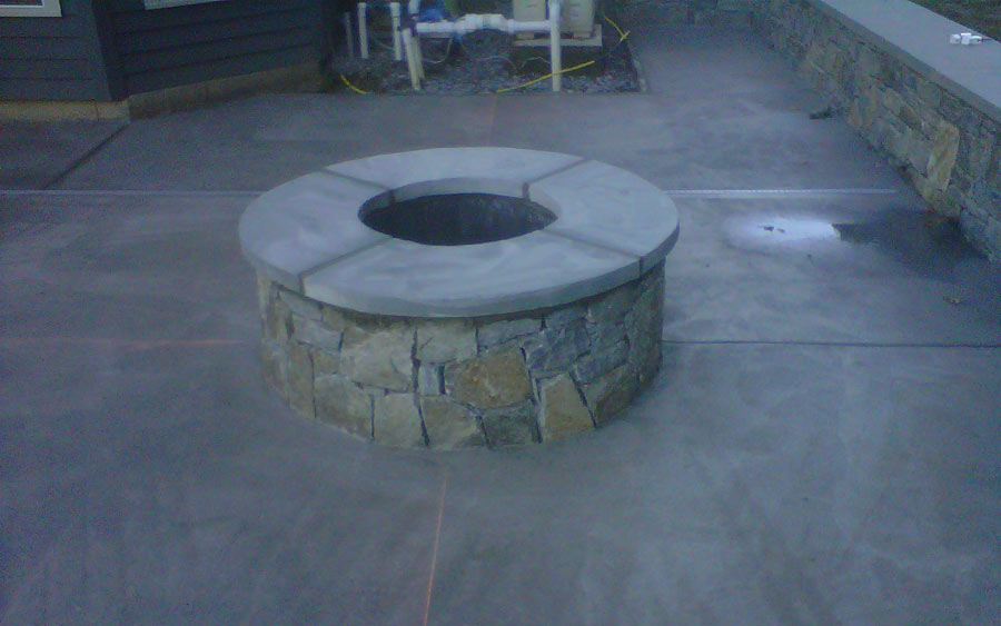 Cobblestone and masonry installation defining a residential entrance